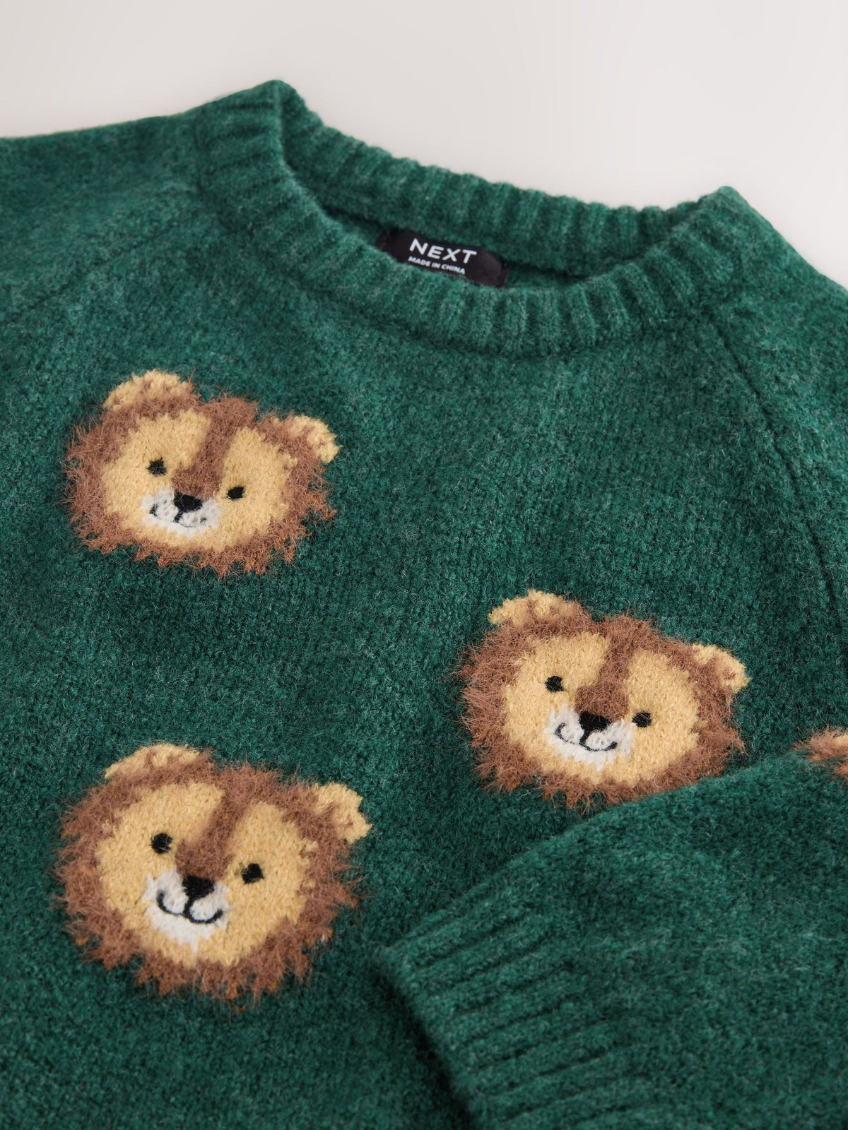 Green Lion All Over Character Knitted Crew Neck Jumper (3mths-7yrs)