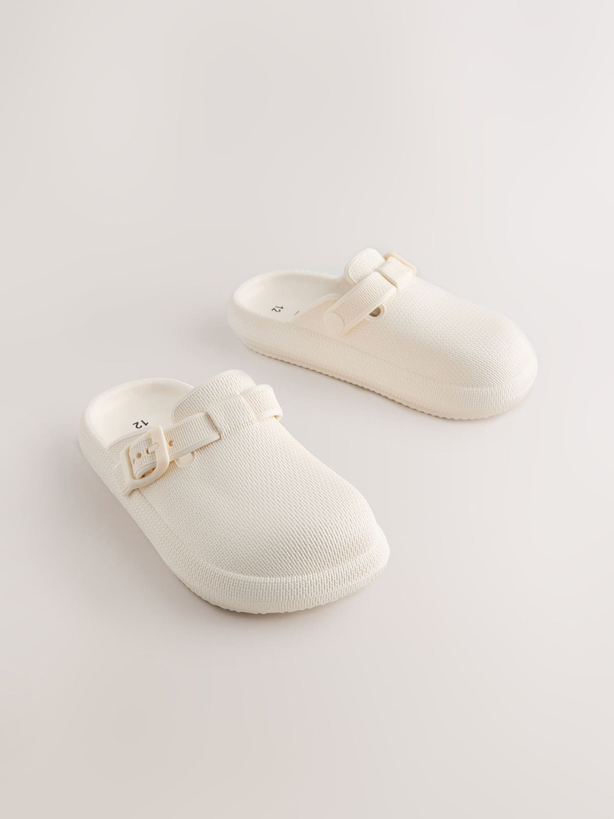 Cream Buckle Clogs