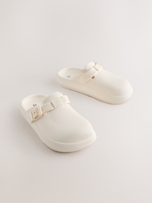 Cream Buckle Clogs