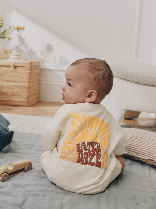 Neutral Sunshine Rebecca Zwanzig Seminal Printed Button Through Baby Romper